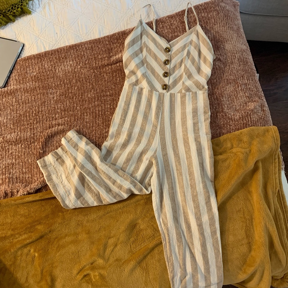 Striped linen jumpsuit with adjustable straps